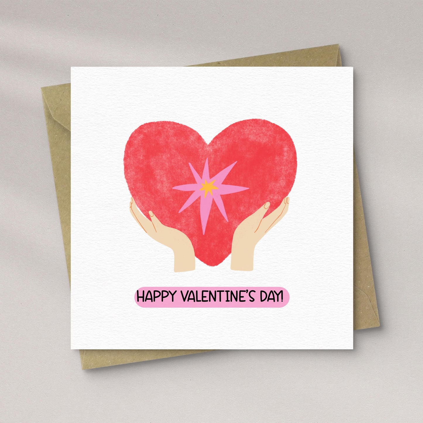 Hands Holding Heart Card